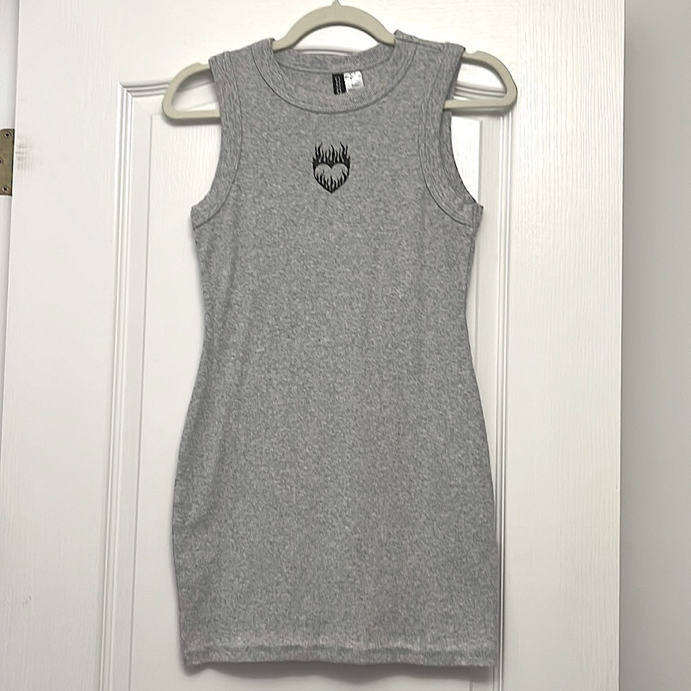 Brand is H&M it’s a body-con I’m selling it because I just don’t wear it enough.